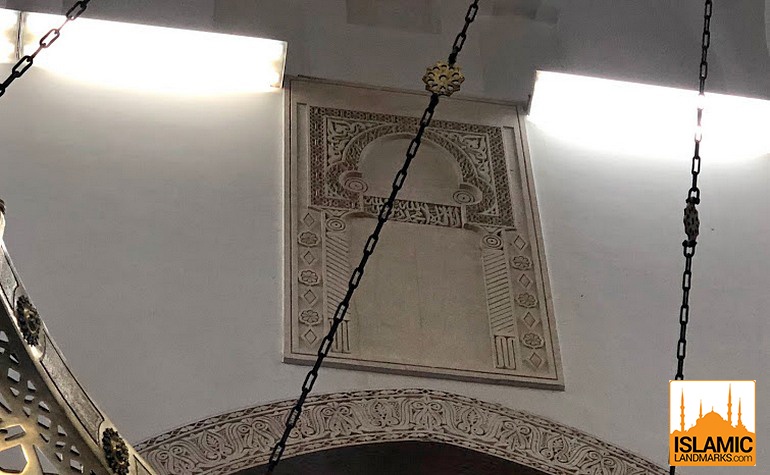 Marker opposite the present qiblah wall showing the direction of the original qiblah