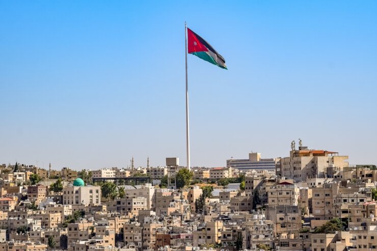 city in jordan with national jordanian flag